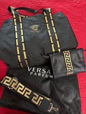 NEW…Versace Black and Gold Travel Bag. Small companion makeup bag included.